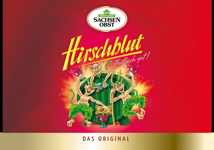 Etikett des Hirschblut Mehrfruchtweins mit goldenem Hirschmotiv auf dunklem Grund